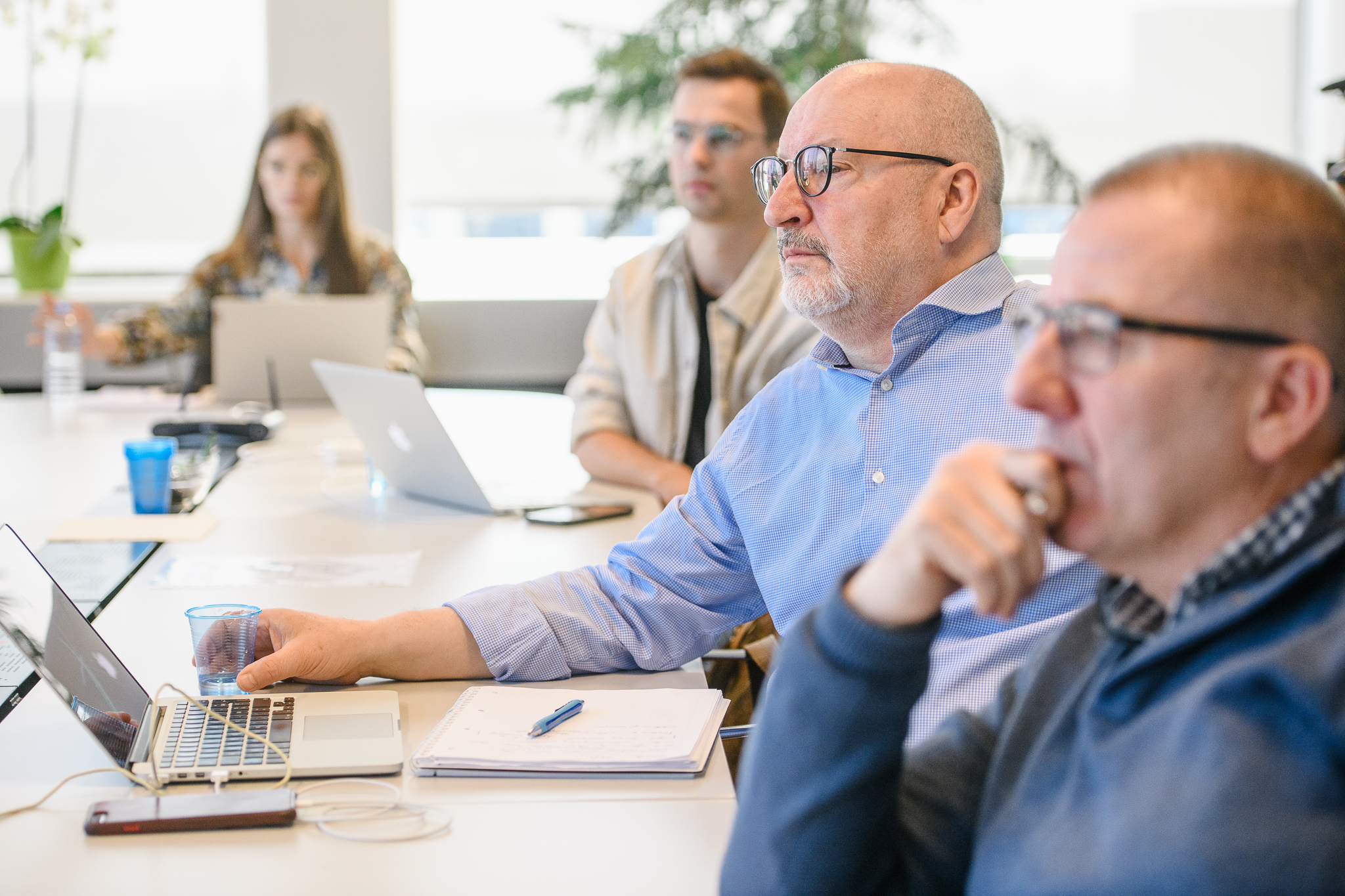People discussing in a focus group around DEI practices